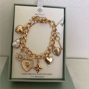 Gold Charm Bracelet with Heart and Shell Accents